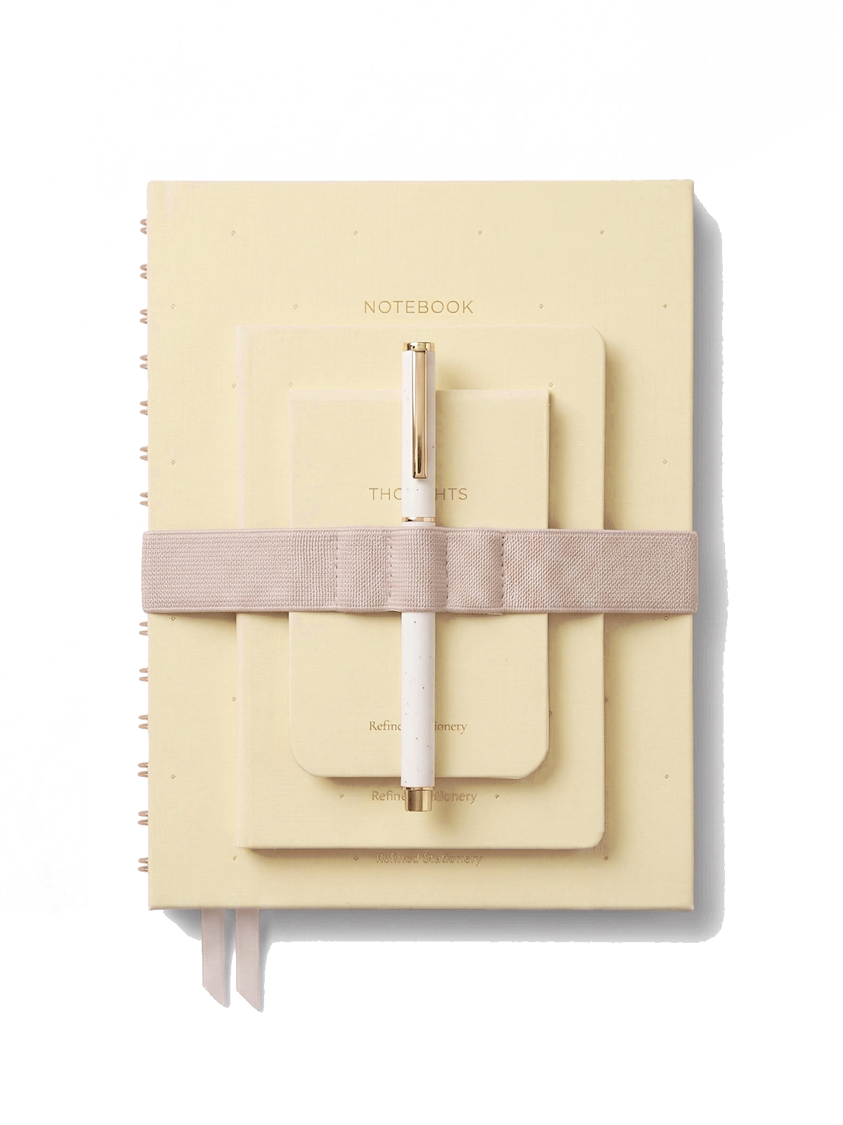 conjunto de cuadernos entelados en color mantequilla